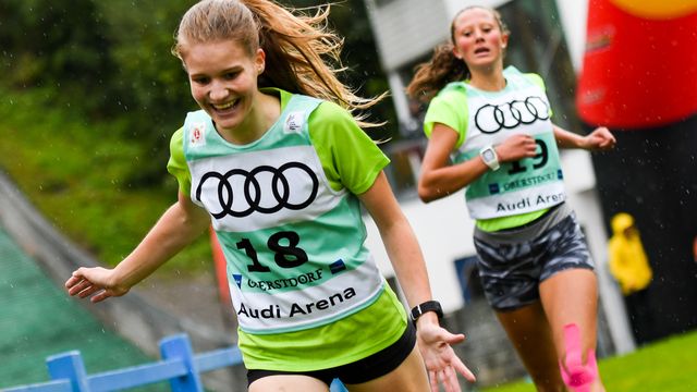 Ema Volavsek finishing the cross-country run in Oberstdorf