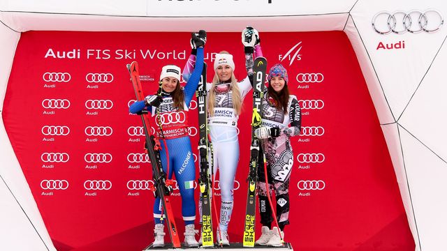 GARMISCH-PARTENKIRCHEN, GERMANY - FEBRUARY 04: Sofia Goggia of Italy takes 2nd place, Lindsey Vonn of USA takes 1st place, Tina Weirather of Liechtenstein takes 3rd place during the Audi FIS Alpine Ski World Cup Women's Downhill on February 4, 2018 in Garmisch-Partenkirchen, Germany. (Photo by Millo Moravski/Agence Zoom)
