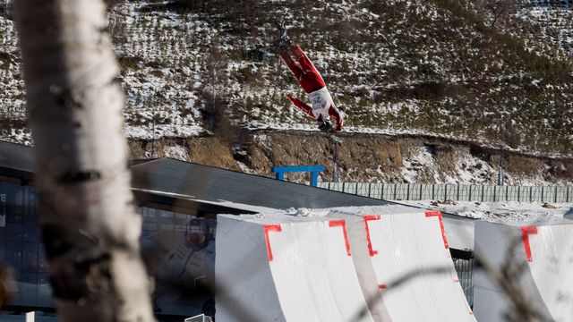 Mischa Gasser (SUI) competing in team aerials finals at the World Cup event in Secret Garden (CHN). Photo: Mateusz Kielpinski (FIS)