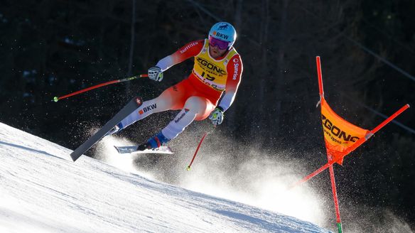 Smooth Monney tames Bormio piste to win first Downhill title 