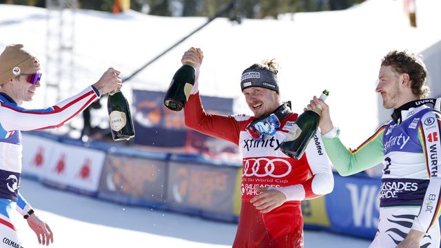 Feller celebrates victory in Palisades Tahoe alongside Linus Strasser (right) and Clement Noel (left)