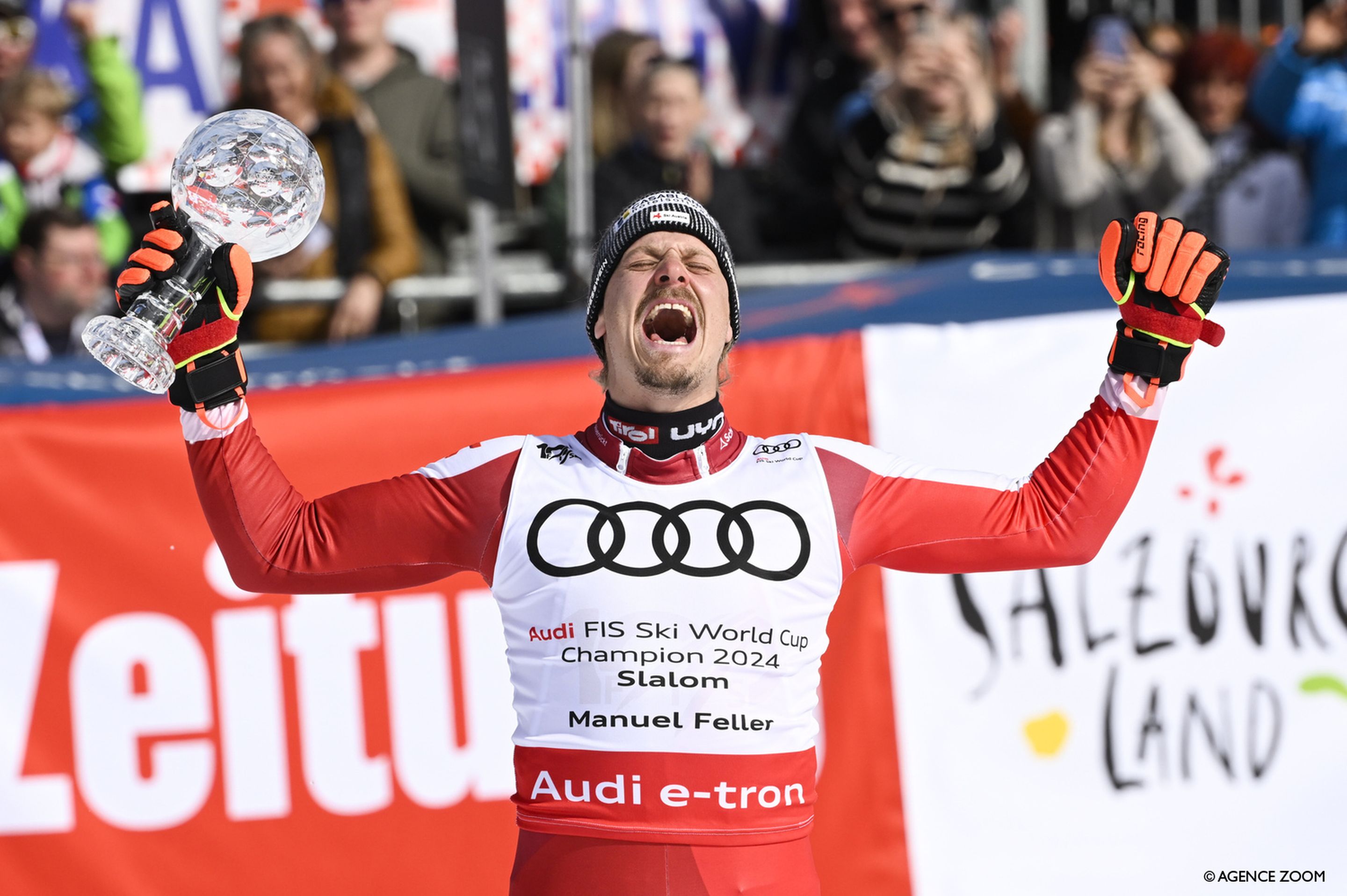 Feller celebrates his slalom crystal globe at home