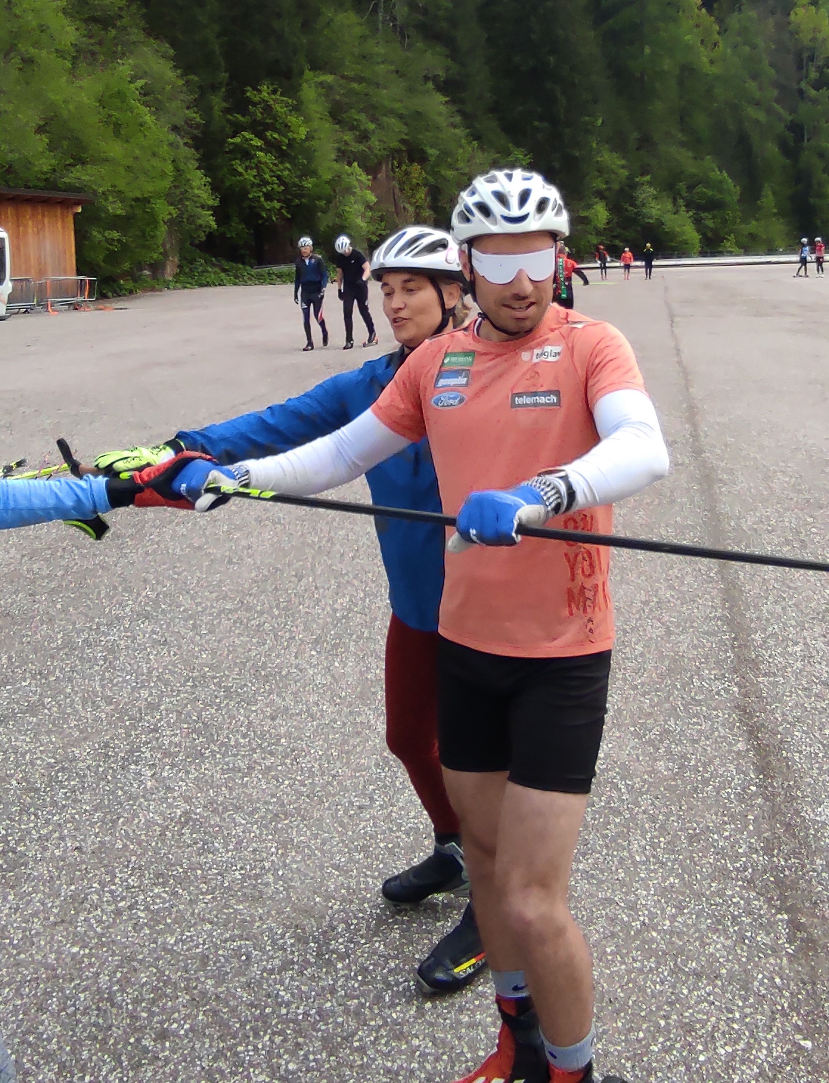 Coach wearing special glasses to simulate visual impairment during a dryland training