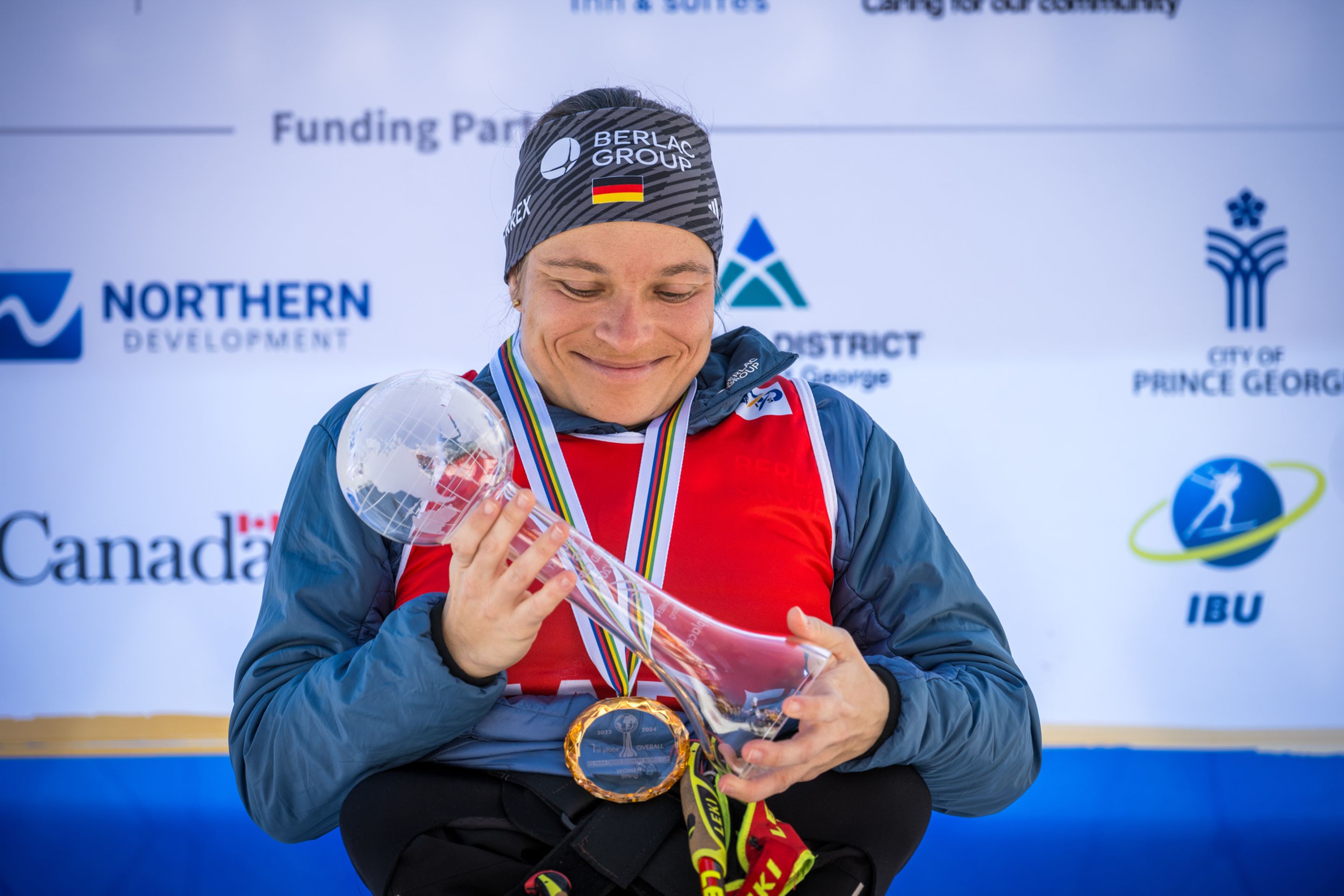 Anja Wicker (GER) holding her overall crystal globe