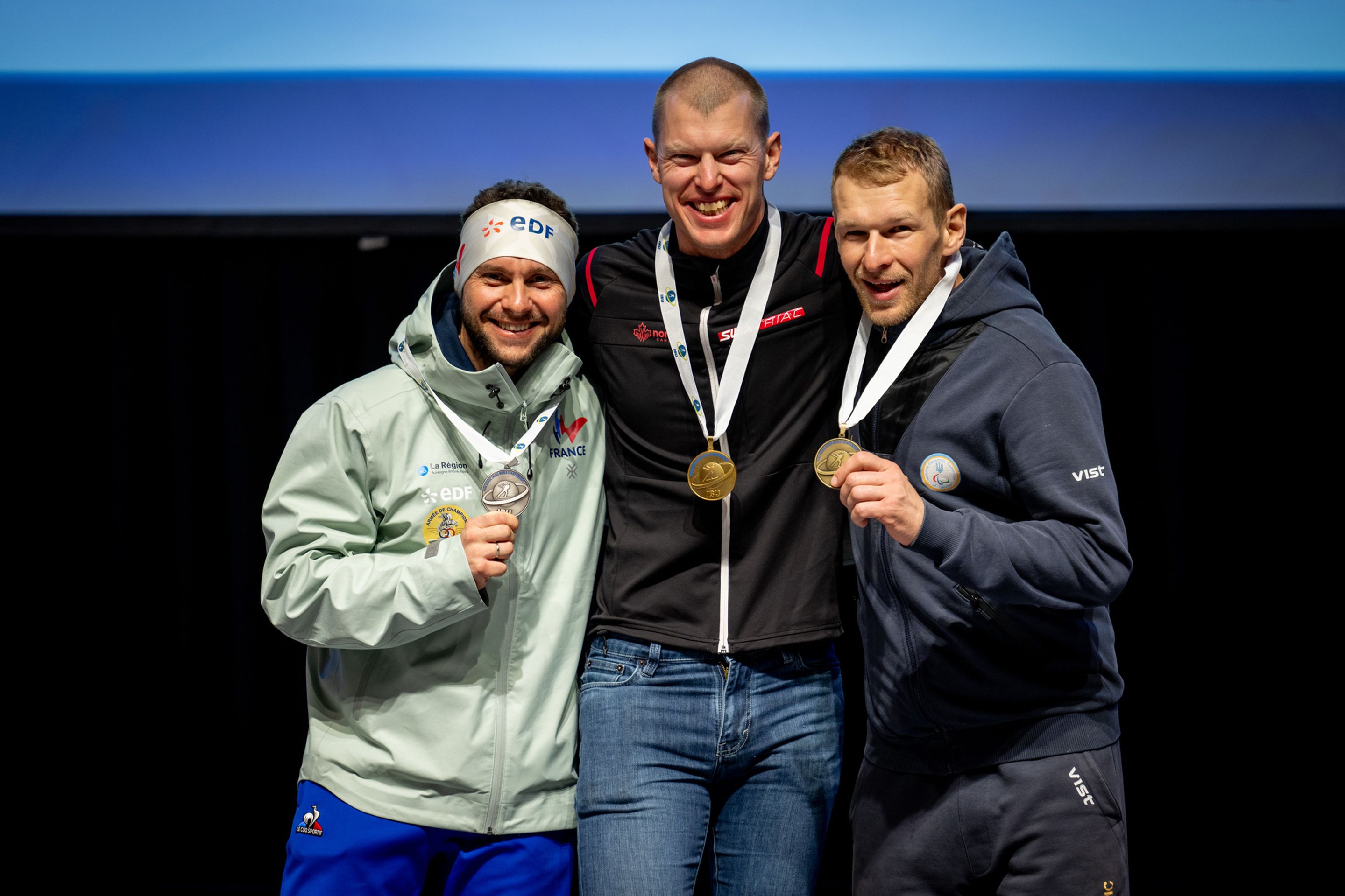 Benjamin Daviet (FRA), Mark Arendz (CAN) and Grygorii Vovchynskyi (UKR) during the medals ceremony of the 12.5km biathlon race