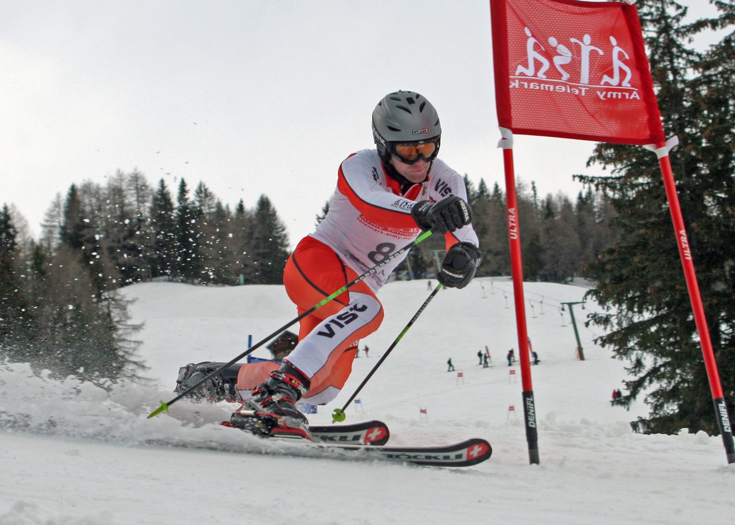 Adrian Pery competing in Telemark Skiing