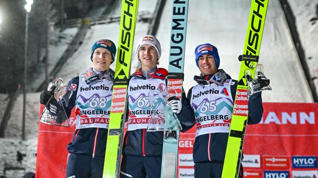 Hoerl (left), Tschofenig and Kraft celebrate the Austrian clean-sweep. ©Authamayou/NordicFocus
