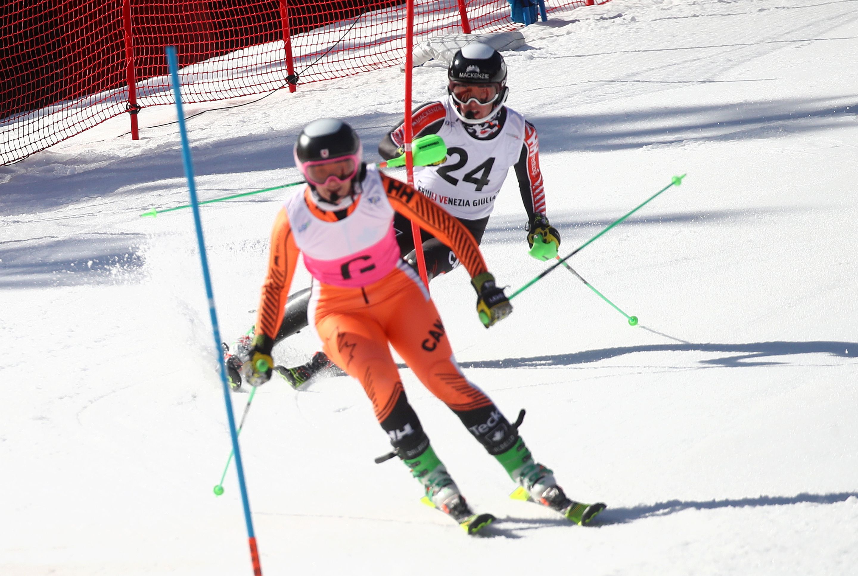 Sierra Smith (CAN) and Kalle Ericsson (CAN) in action during the first run of the slalom in Sella Nevea