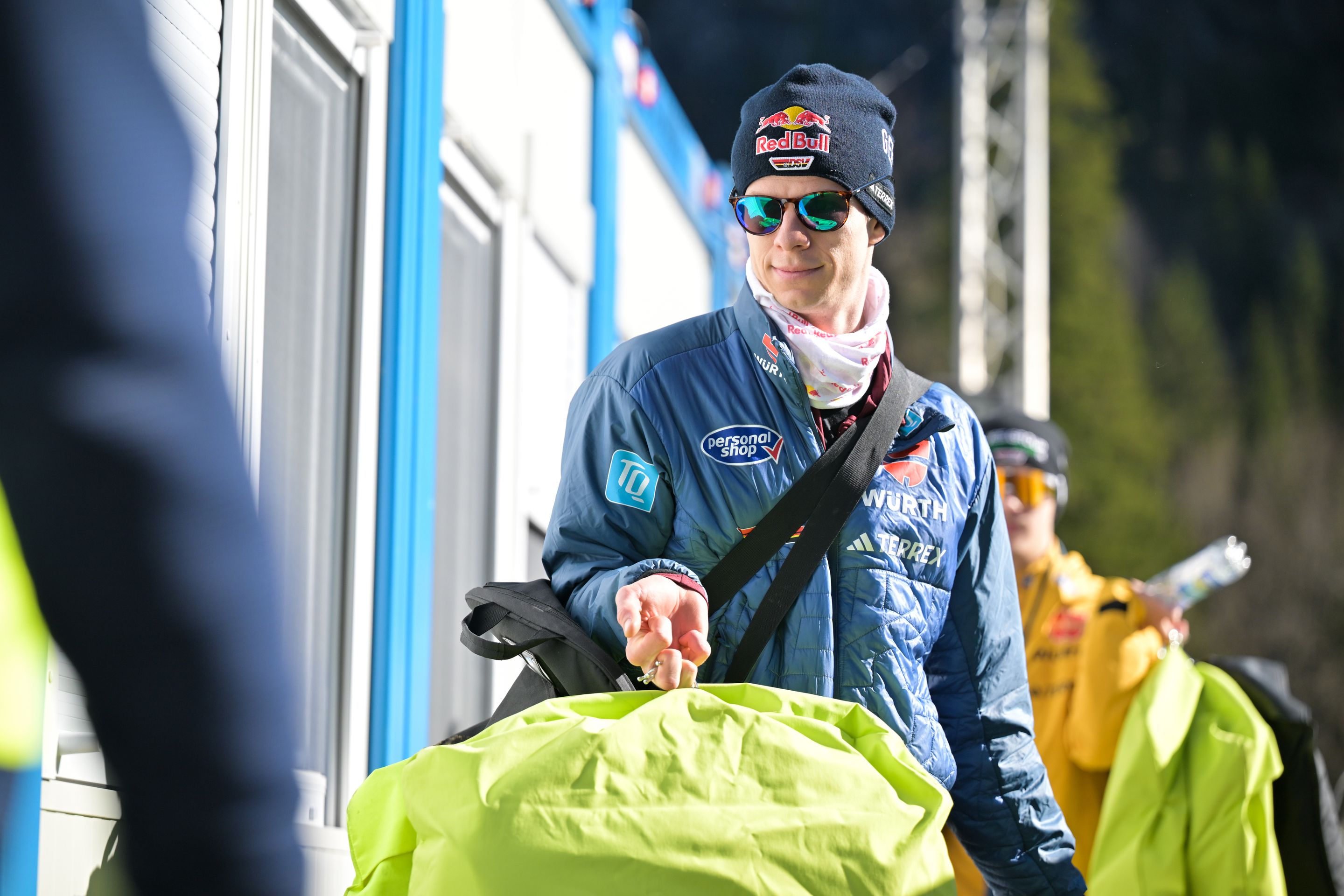 Andreas Wellinger (GER) carrying multiple suits in Oberstdorf (GER)