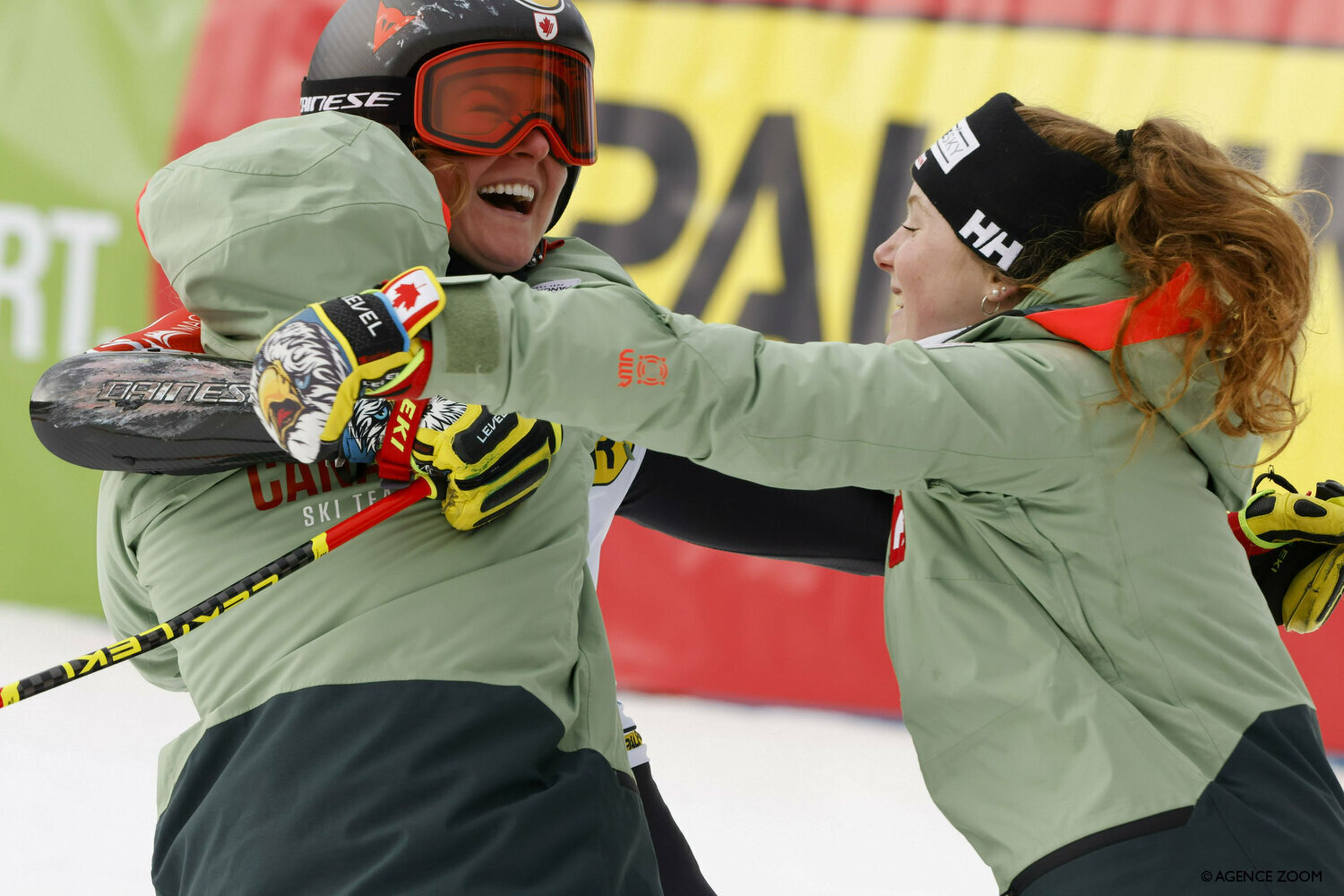 Grenier is mobbed by her Canadian teammates in the finish area (Agence Zoom)