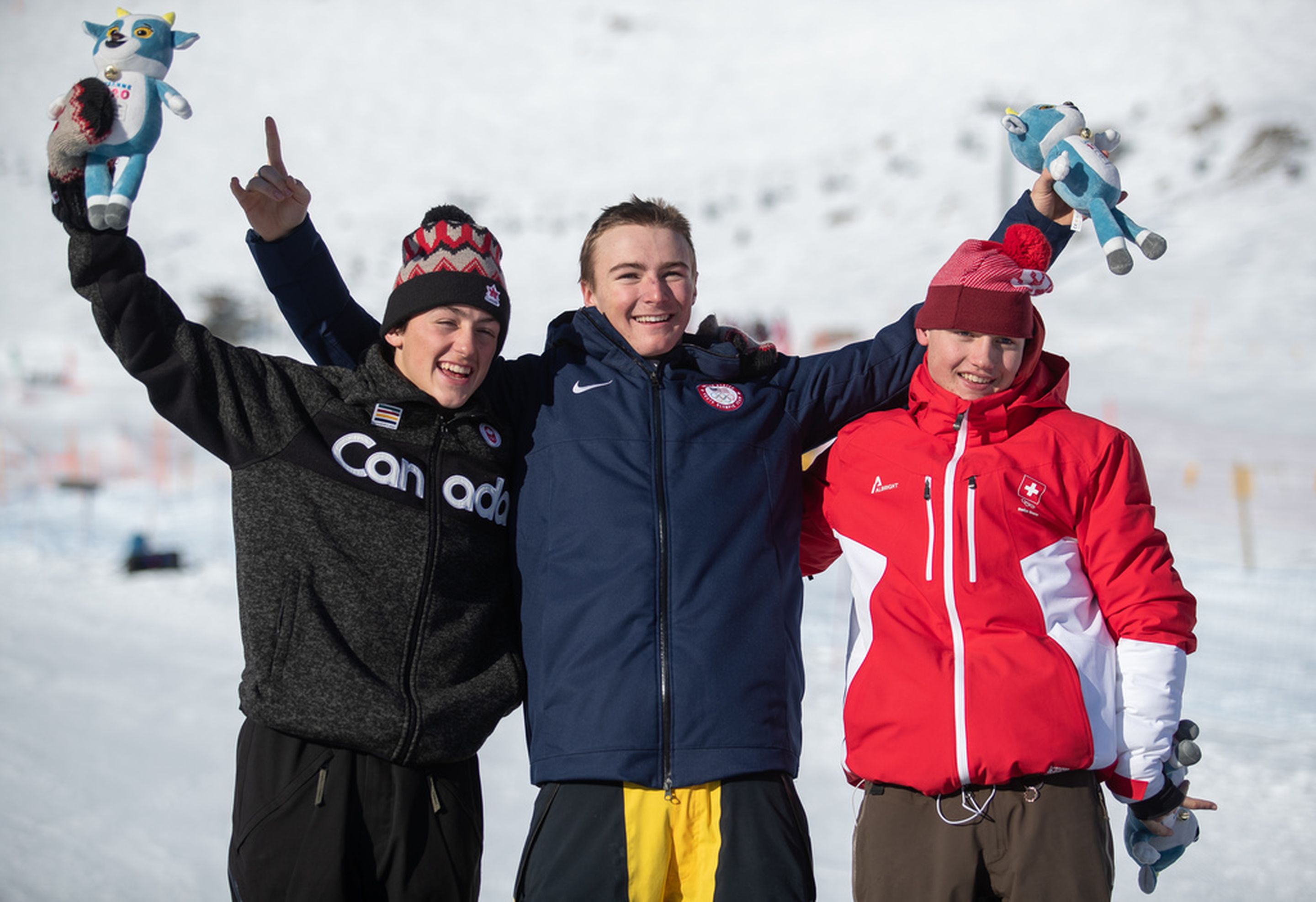 Men's slopestyle podium: 2nd Liam Braerley (CAN), 1st Dusty Henricksen (USA), 3rd Nick Puenter (SUI) © IOS