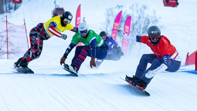 Eliot Grondin (CAN), in red, won both World Cups in China last season © FIS/Miha Matavz