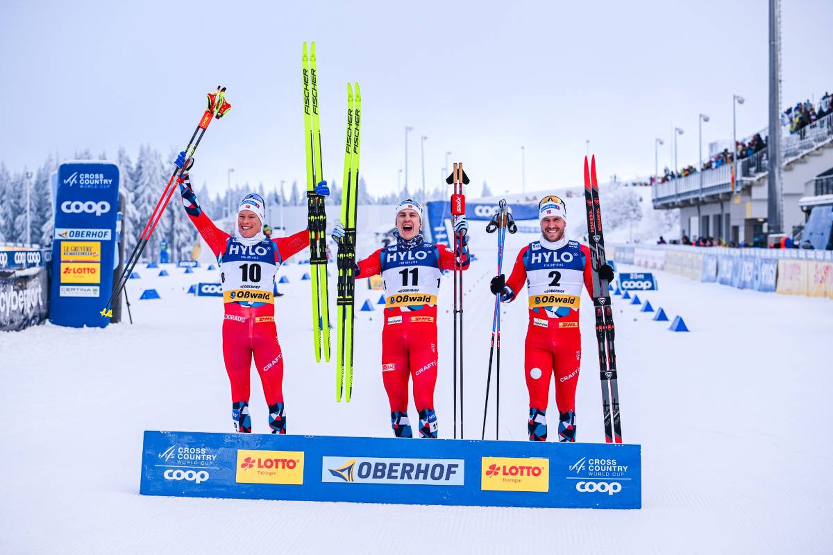 Another clean sweep for Norway: Martin Loewstroem Nyenget (left), Erik Valnes (middle) and Paal Golberg (right) celebrate on the podium © NordicFocus