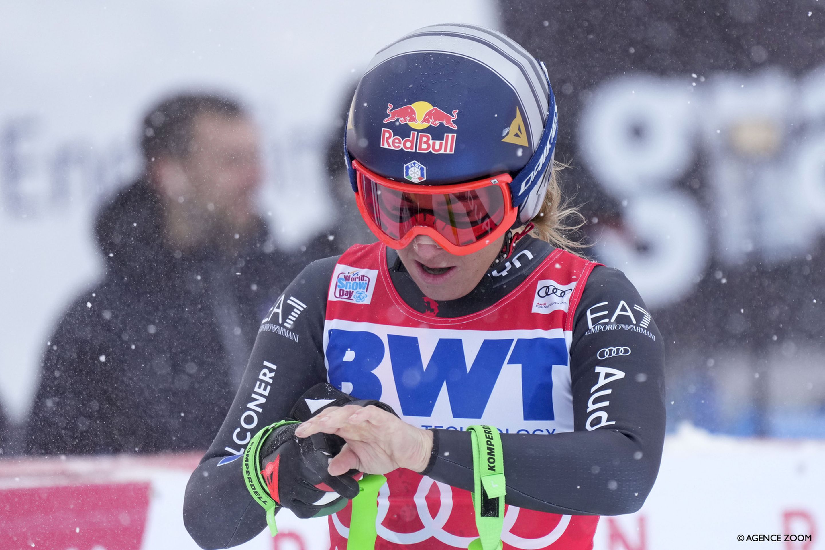 Soffia Goggia surveys the damage to her hand after finishing second in the St. Moritz downhill (Agence Zoom)