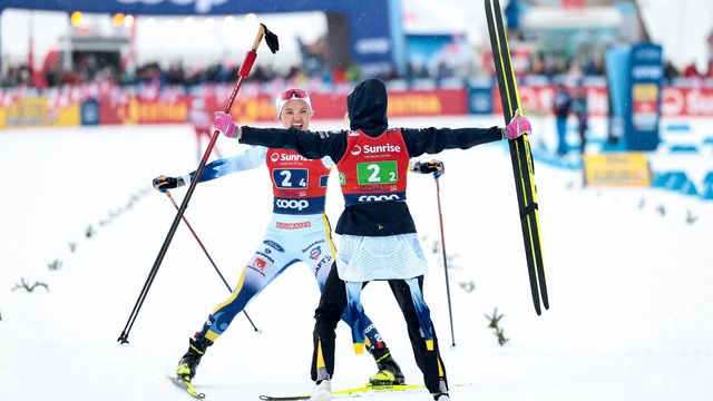Bring it in: Svahn (left) and Karlsson celebrate mixed relay victory for Sweden 1 @ Nordic Focus