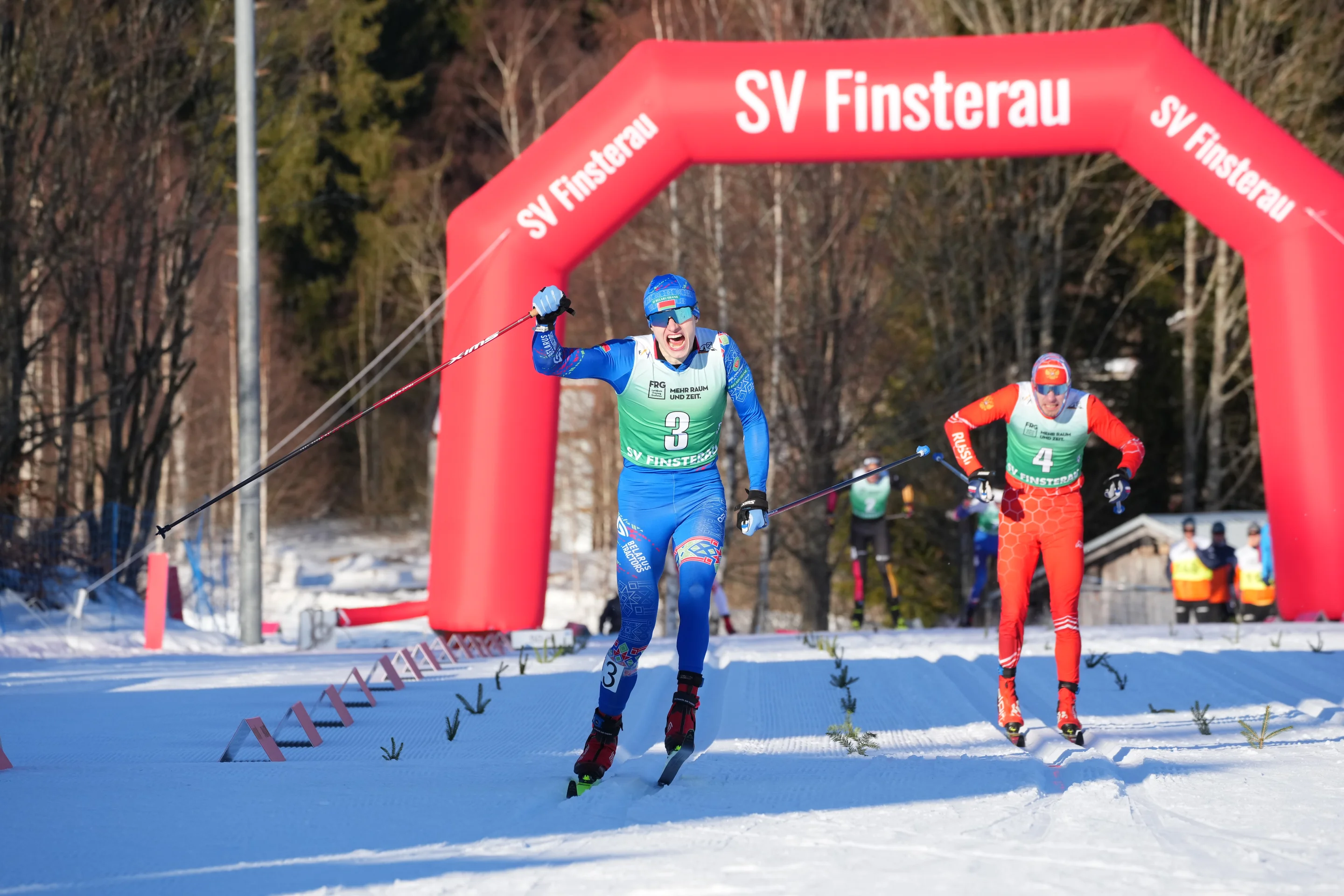 Svirydzenka (L) celebrates victory ahead of Malyshev