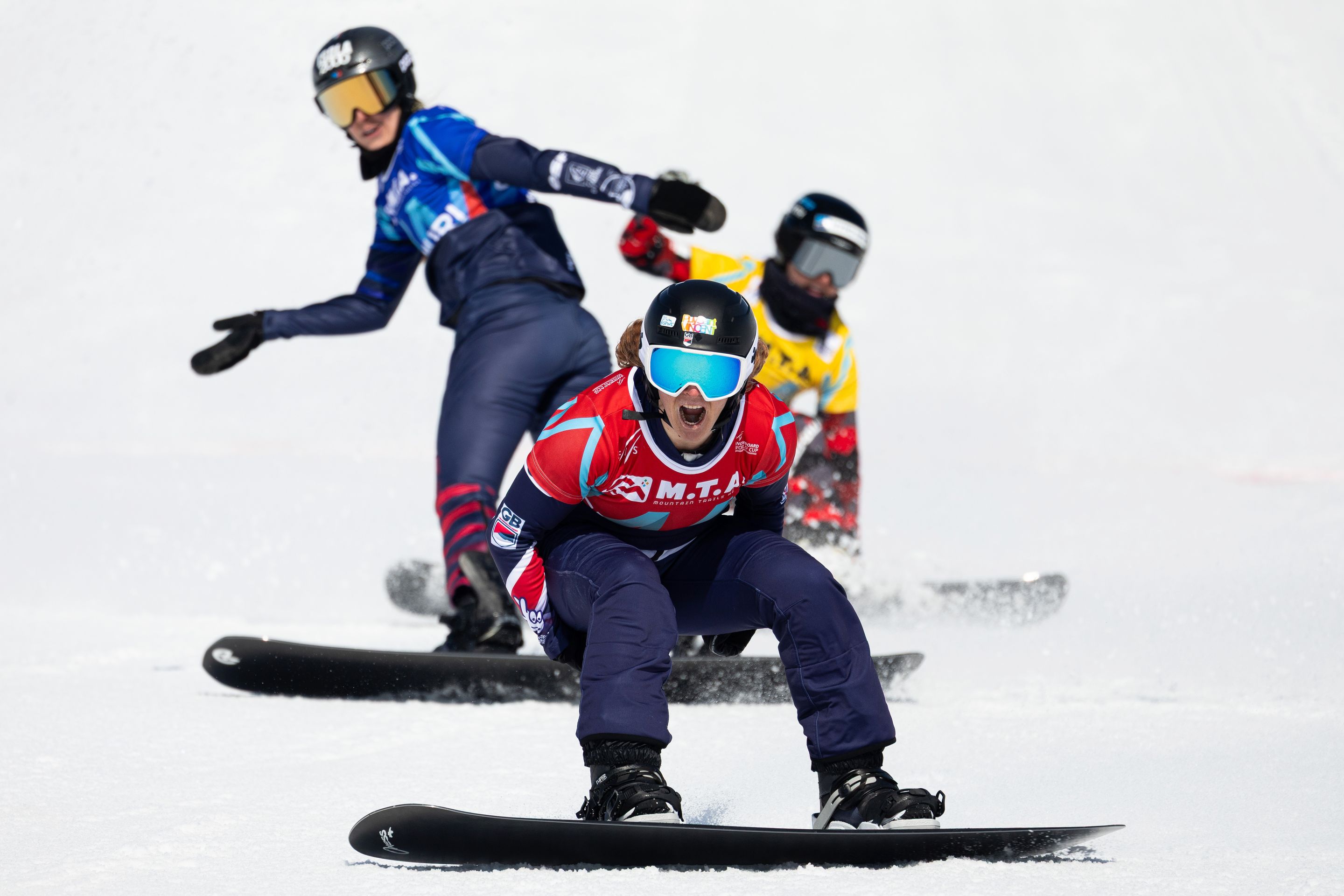 Charlotte Bankes, in red, celebrates winning her 25th individual World Cup race in Gudauri