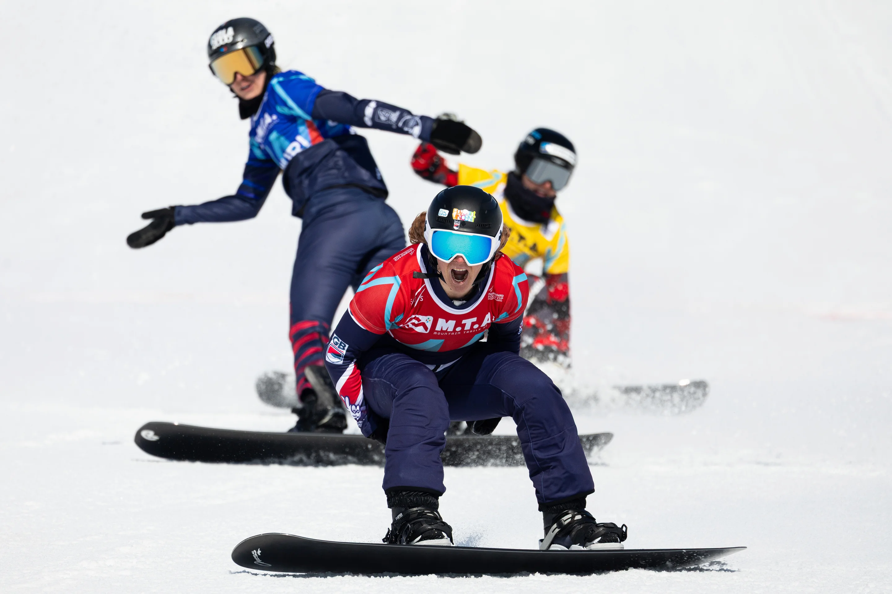 Charlotte Bankes, in red, celebrates winning her 25th individual World Cup race in Gudauri