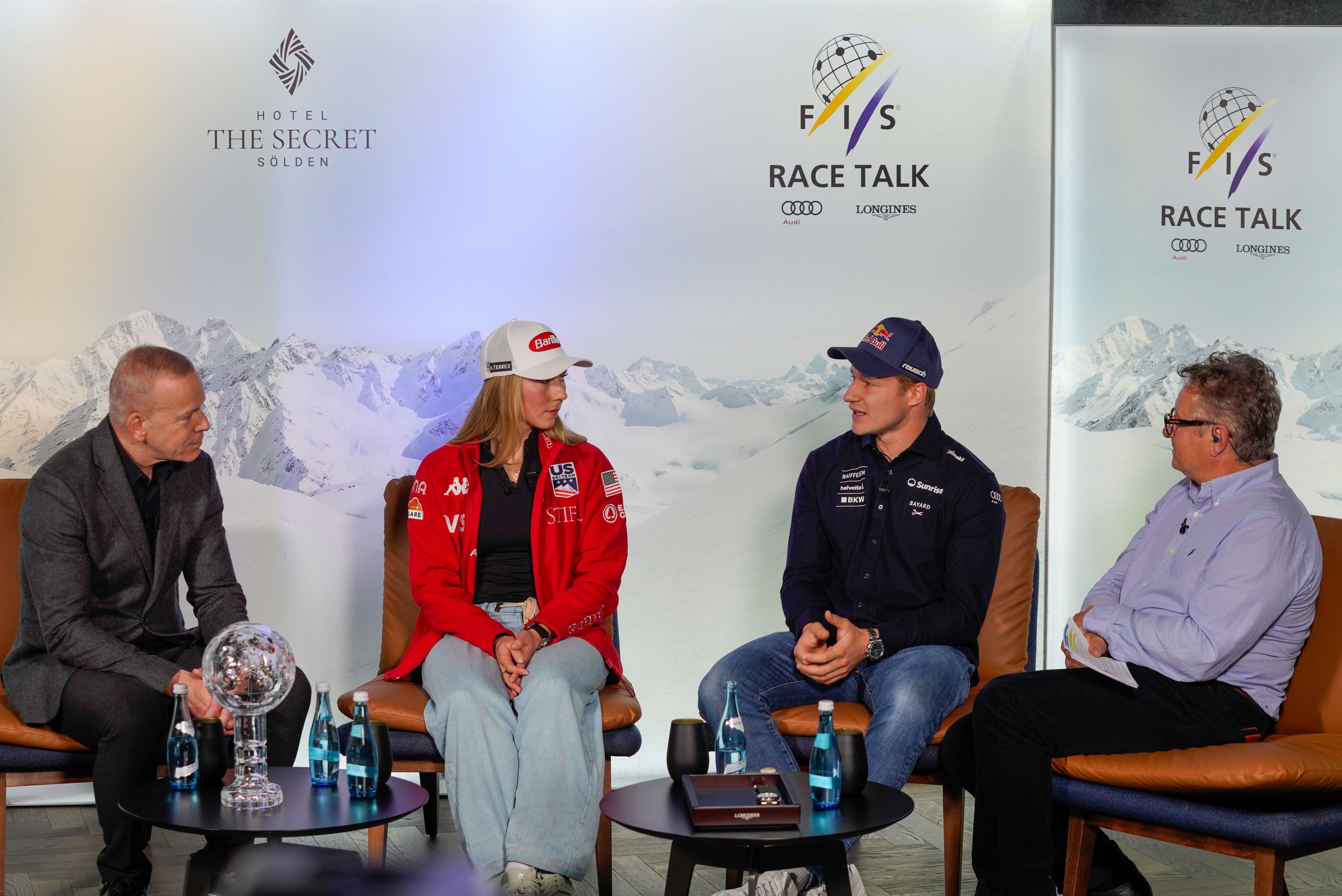 Longines Ambassadors Odermatt and Shiffrin talk with Longines CEO Matthias Breschan (left)