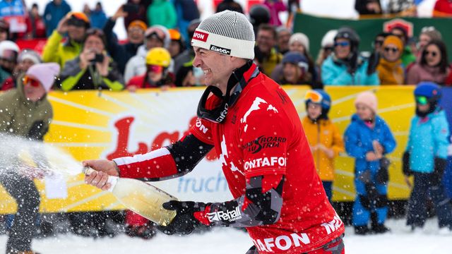 Alessandro Haemmerle (AUT) sprays champagne after winning both races on home snow