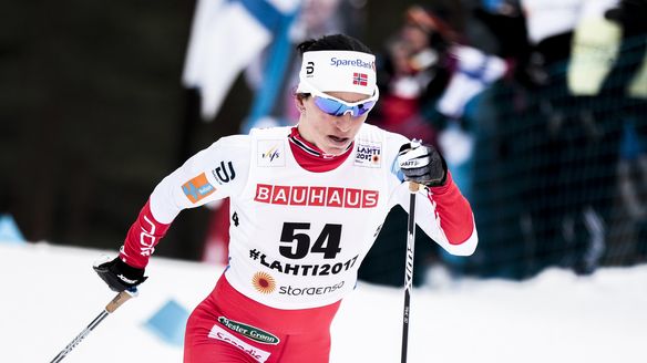 Bjoergen takes gold in ladies' 10 km classic