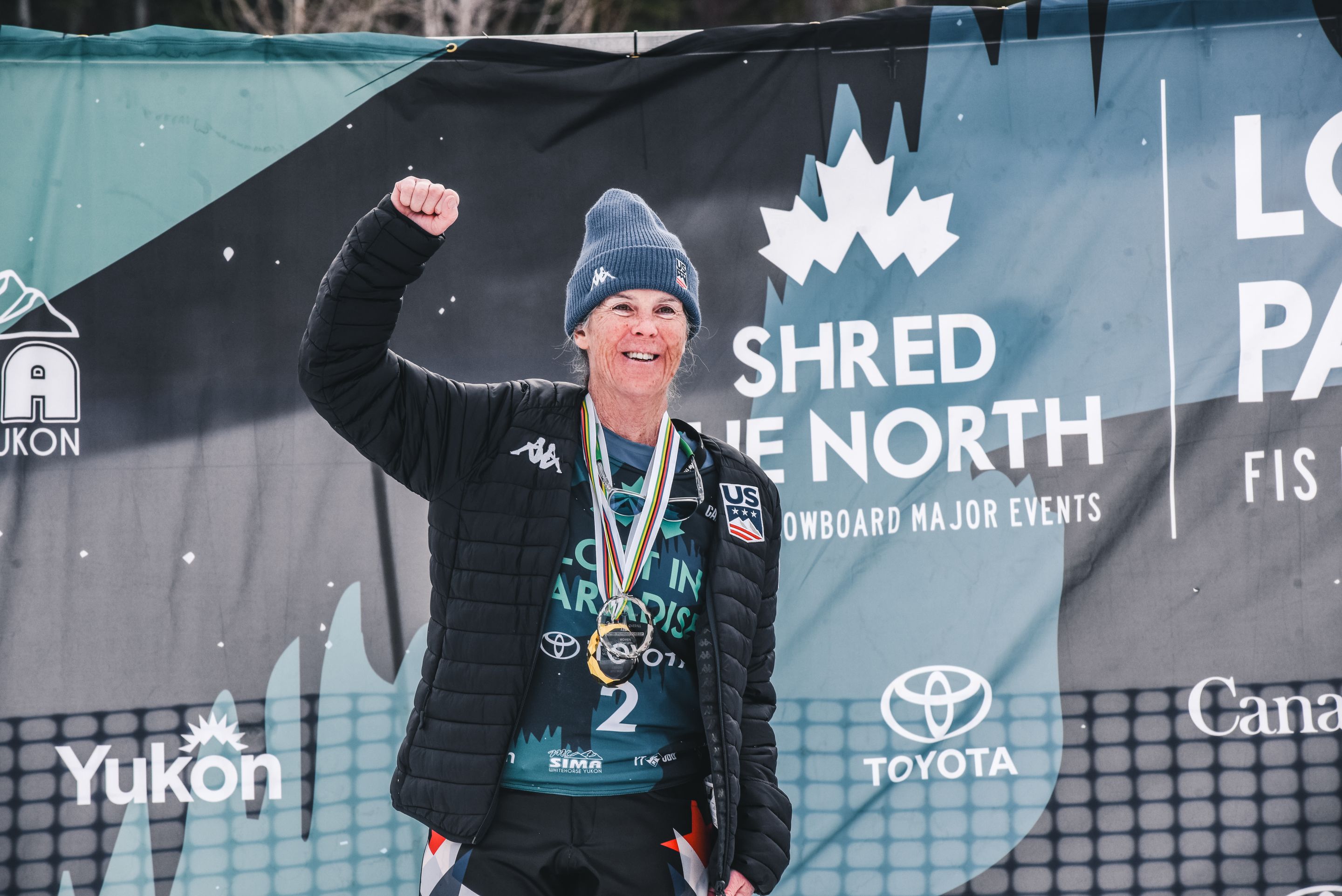 Peggy Martin (USA) with her golden and silver crystal medals around the neck during the globes ceremony in Mt. Sima