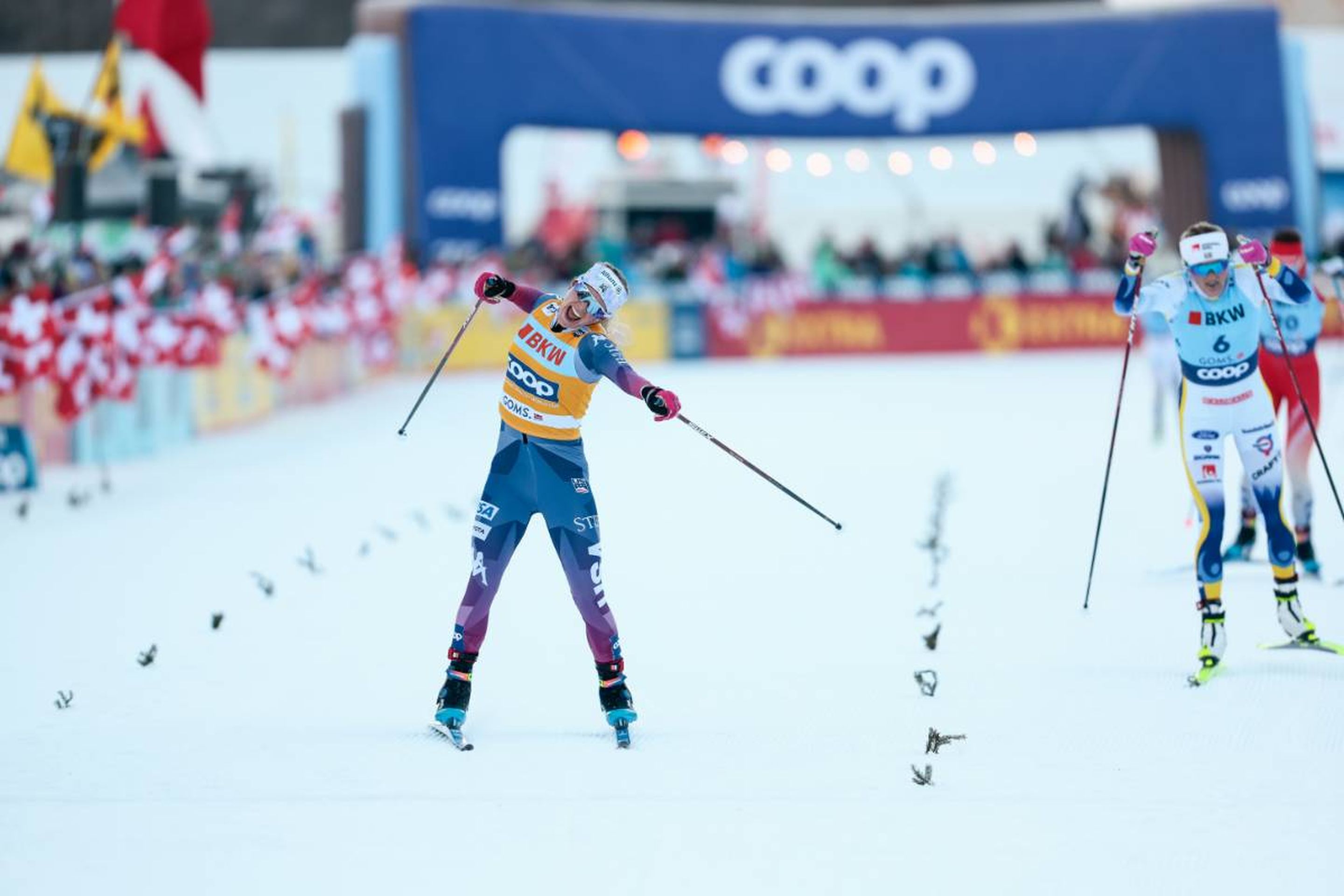 An exhausted Jessie Diggins wins the 20km mass start free in Goms before Sweden's Frida Karlsson (right) after an impressive sprint, despite saying she did not feel her legs © NordicFocus
