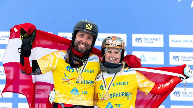 Andreas Prommegger (AUT) and Julie Zogg (SUI) win PSL gold at Bakuriani World Championships 2023 © Miha Matavz/FIS