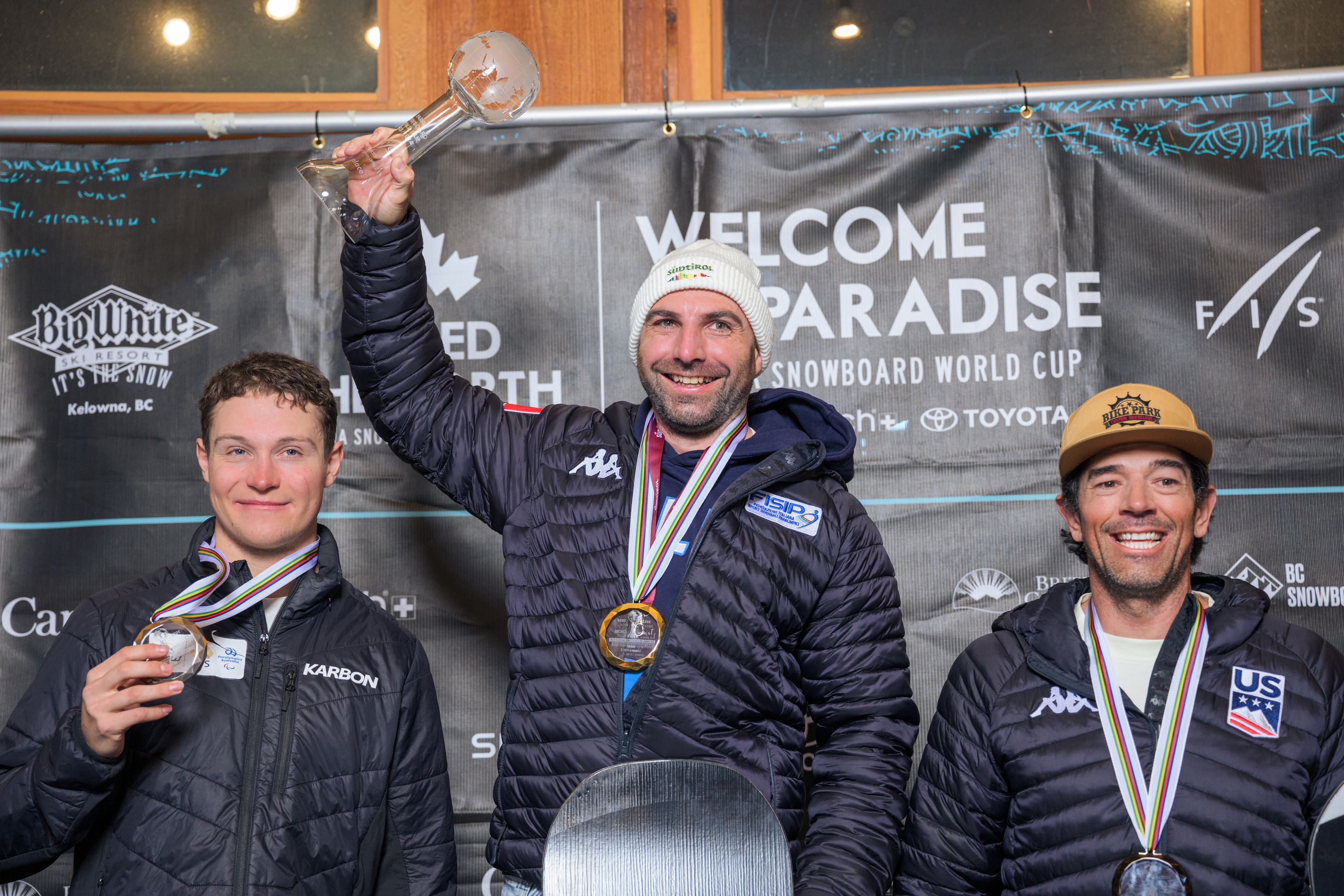 Ben Tudhope (AUS), Emanuel Perathoner (ITA) lifting his crystal globe and Keith Gabel (USA)