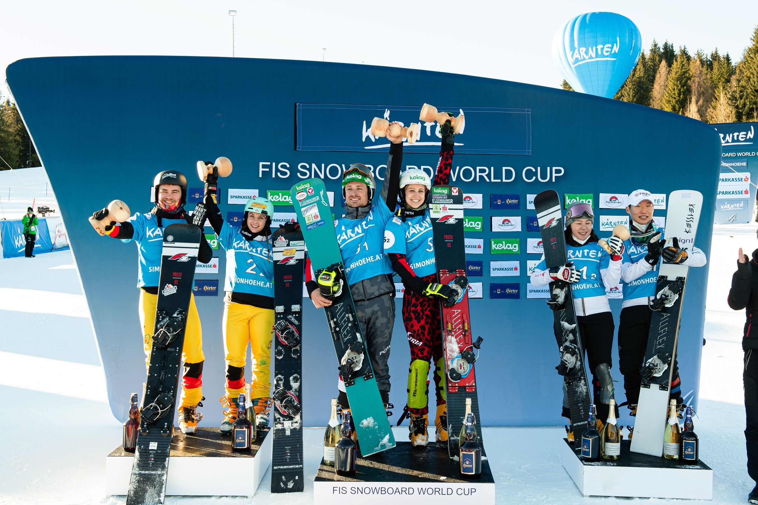 FIS Snowboard World Cup - Simonhöhe AUT - Snowboard Parallel Team Event - Podium with 2nd team Germany 2 (BAUMEISTER Stefan and HOCHREITER Melanie), 1st team Austria 3 (PAYER Alexander and SCHOEFFMANN Sabine) and 3rd team Republic of Korea 1 (LEE Sangho and JEONG Haerim) © Miha Matavz/FIS