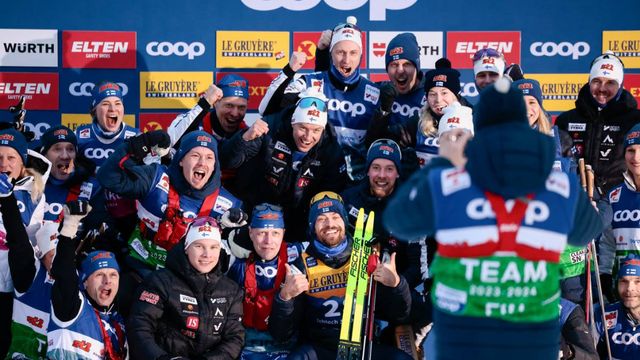 Team effort: Hyvärinen (bottom centre) celebrates his first World Cup victory @ Nordic Focus