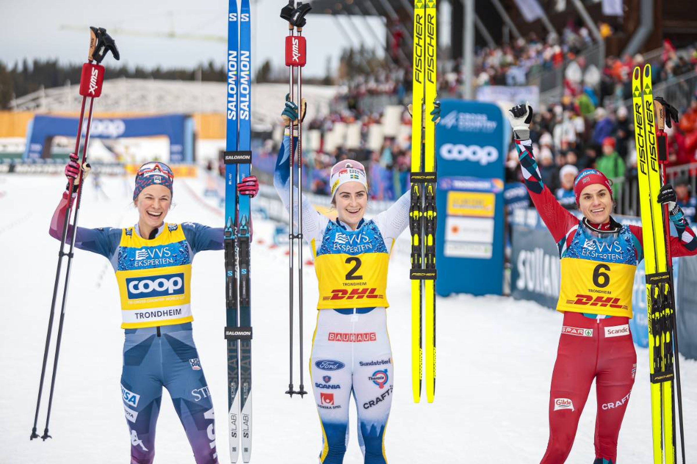 All smiles on the podium as USA's Jessie Diggins (left), Sweden's Ebba Andersson (middle) and Norway's Heidi Weng (right) celebrate their strong performances in the women's 20km skiathlon on Saturday © NordicFocus