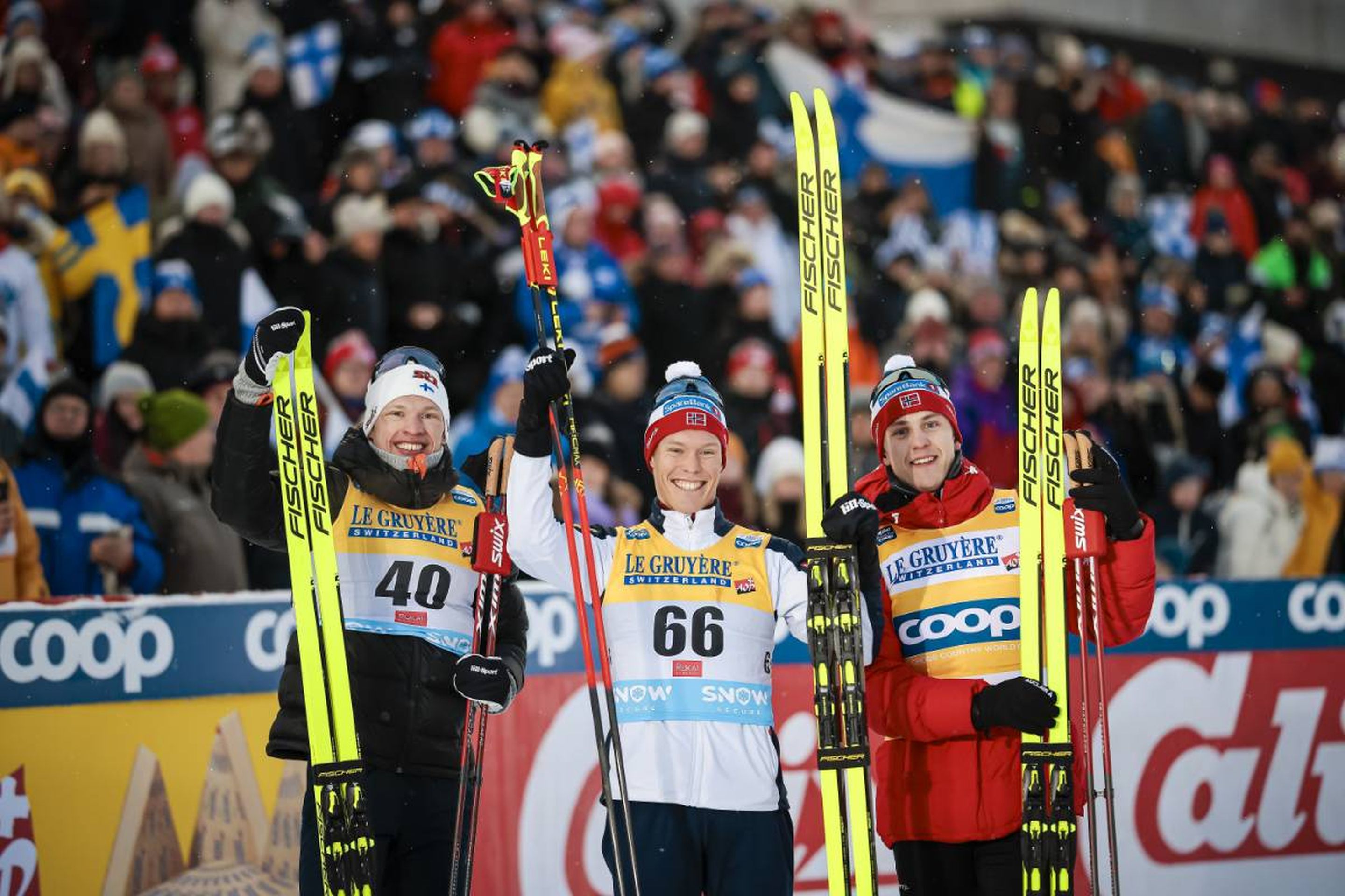 Finland's Iivo Niskanen (left), Norway's Martin Loewstroem Nyenget (middle) and Erik Valnes (right) claimed the top-three spots in the men's classic 10km in Ruka, Finland © NordicFocus