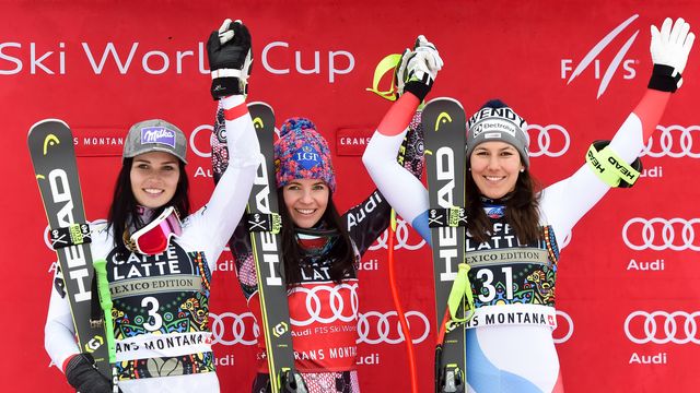 CRANS-MONTANA, SWITZERLAND - MARCH 03: Anna Veith of Austria takes 2nd place, Tina Weirather of Liechtenstein takes 1st place, Wendy Holdener of Switzerland takes 3rd place during the Audi FIS Alpine Ski World Cup Women's Super G on March 3, 2018 in Crans-Montana, Switzerland. (Photo by Michel Cottin/Agence Zoom)