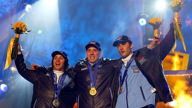Ross Powers (centre) with USA teammates Danny Kass (left) and JJ Thomas (right) after sweeping the Salt Lake 2002 halfpipe podium © GEPA Pictures