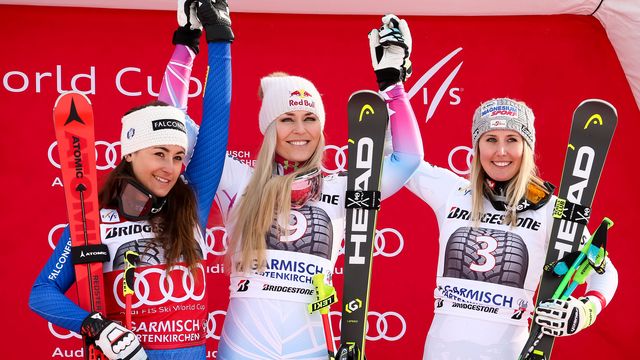 GARMISCH-PARTENKIRCHEN, GERMANY - FEBRUARY 03: Sofia Goggia of Italy takes 2nd place, Lindsey Vonn of USA takes 1st place, Cornelia Huetter of Austria takes 3rd place during the Audi FIS Alpine Ski World Cup Women's Downhill on February 3, 2018 in Garmisch-Partenkirchen, Germany. (Photo by Millo Moravski/Agence Zoom)