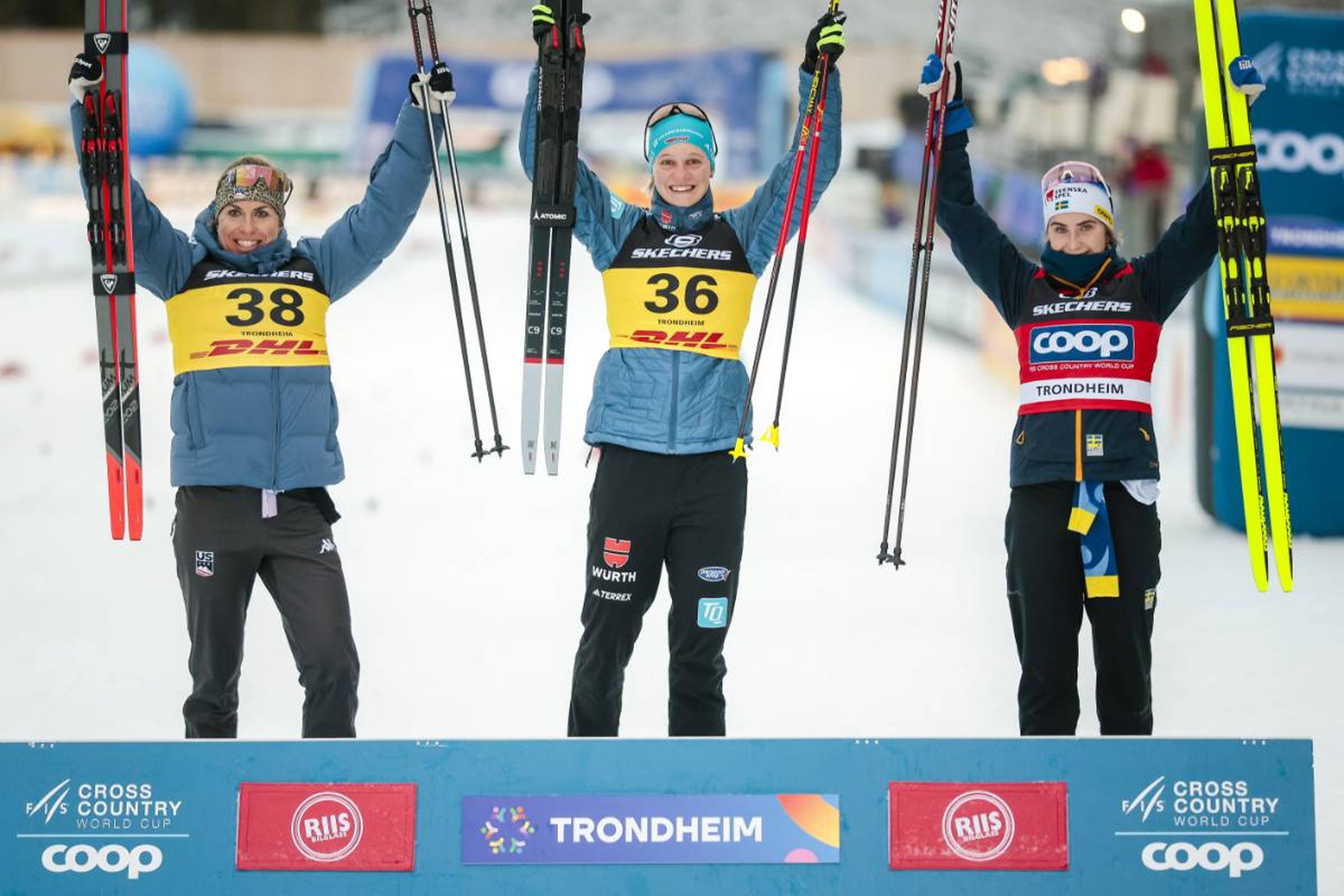 USA's Rosie Brennan (left), Germany's Victoria Carl (middle) and Sweden's Ebba Andersson (right) celebrate on the podium © NordicFocus