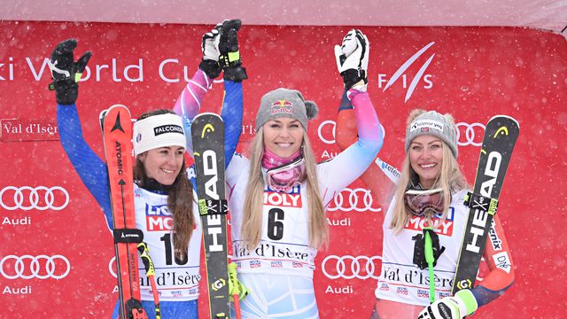 VAL-D'ISERE, FRANCE - DECEMBER 16: Sofia Goggia of Italy takes 2nd place, Lindsey Vonn of USA takes 1st place, Ragnhild Mowinckel of Norway takes 3rd place during the Audi FIS Alpine Ski World Cup Women's Super G on December 16, 2017 in Val-d'Isere, France. (Photo by Michel Cottin/Agence Zoom)