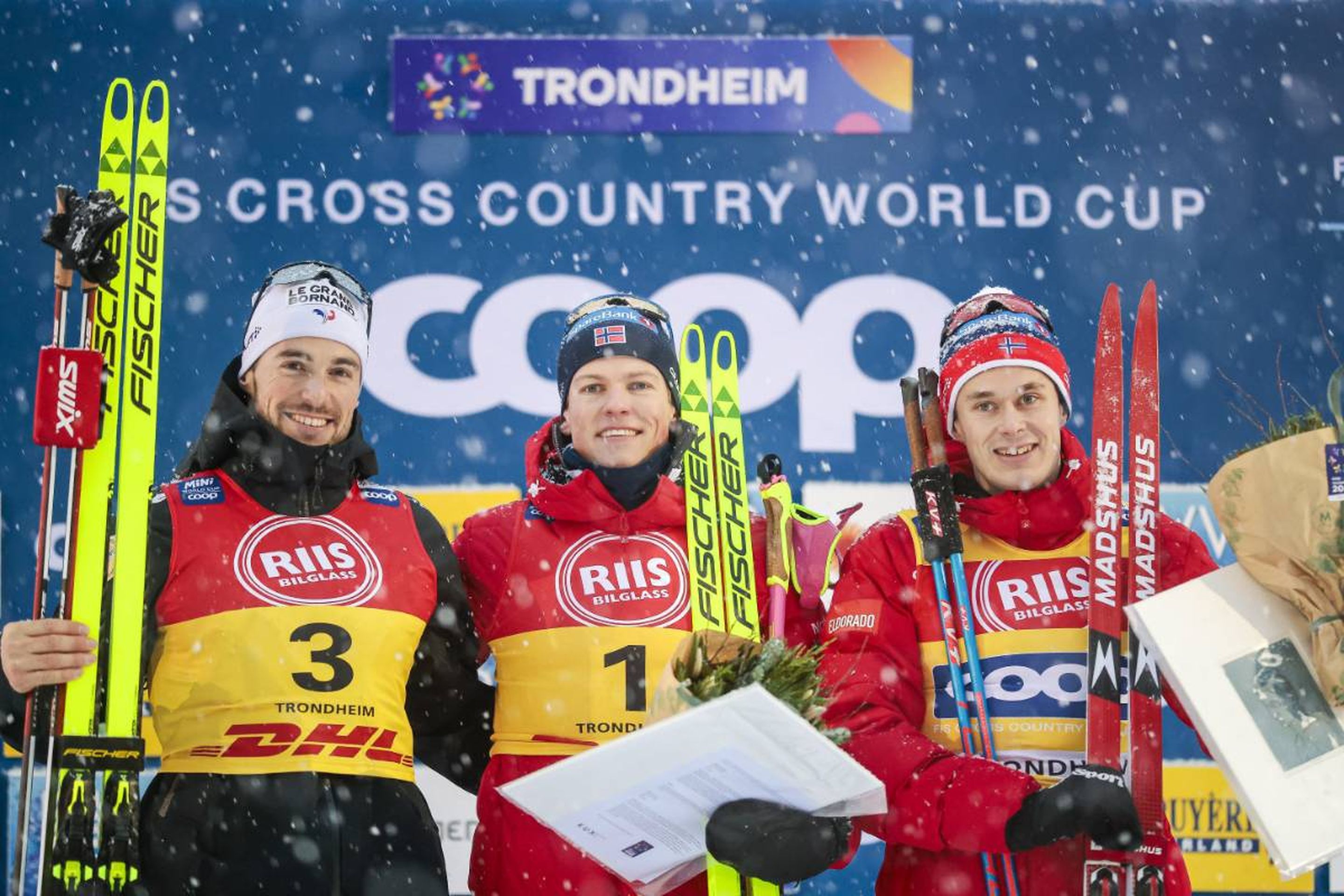 France's Lucas Chanavat (left), Norway's Johannes Hoesflot Klaebo (middle) and Harald Oestberg Amundsen (right) on the podium © NordicFocus