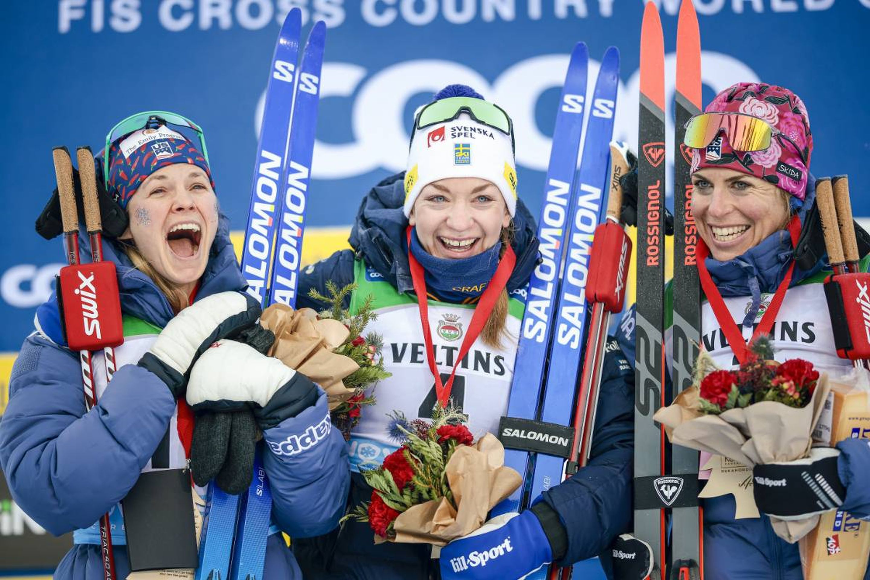 USA's Jessie Diggins (left), Sweden's Moa Ilar (middle) and Rosie Brennan (right), also from USA, on the podium © NordicFocus