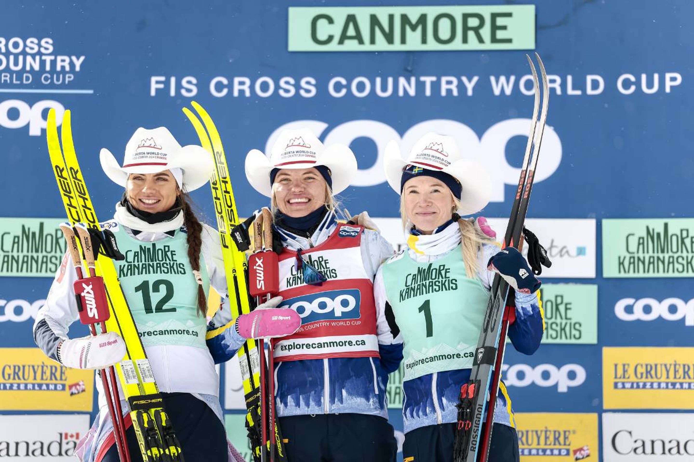 Norway's Kristine Stavaas Skistad (left) celebrate on the podium with Sweden's Linn Svahn (centre) and Jonna Sundling (right) © NordicFocus