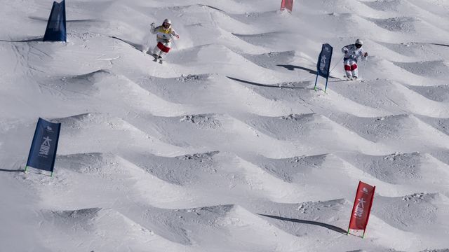 Mikael Kigsbury (CAN) and Benjamin Cavet (FRA) in dual moguls action in Thaiwoo